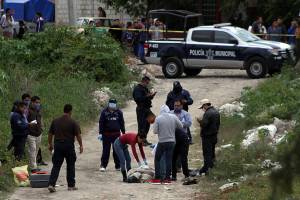 Hallan cadáver de mujer en bolsa para basura en Tehuacán