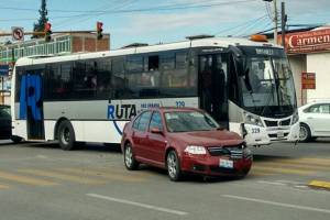 Unidad de RUTA y vehículo particular protagonizaron colisión en Agua Santa