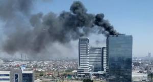 Se incendia torre Titanium, en la zona de Ciudad Judicial; no hubo lesionados