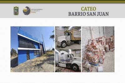 Localizan 480 cajas con electrodomésticos y camiones robados en Puebla