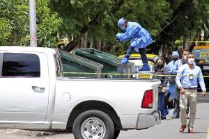 FOTOS: Hallan cadáver dentro de un contenedor de basura en Loma Bella
