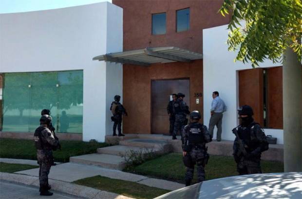 Catean casa de los suegros de Duarte y hallan 54 mil dólares