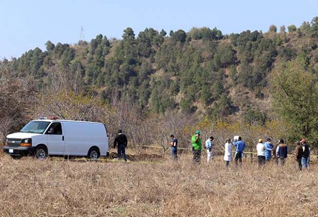 Hallan cuerpo calcinado en Santiago Xalitzintla