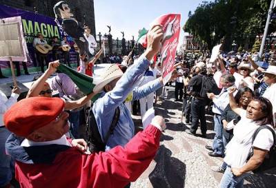 Fracasa marcha anti Trump en Puebla; pelean organizaciones