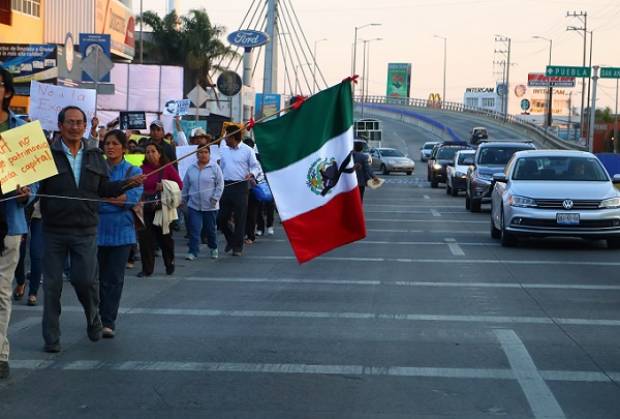 Sujeto atropelló a manifestante en Cholula