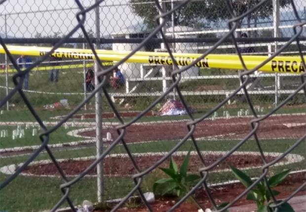 Fiscalía identifica a dos asesinados en campo de beisbol de Acatzingo