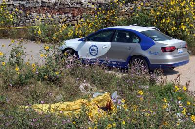 Hallan cadáver de un hombre envuelto en una lona en San Jerónimo Caleras