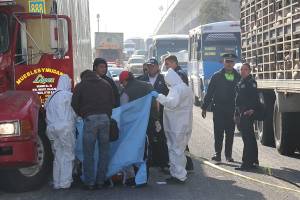 FOTOS: Chofer de mudanza fue asesinado de un balazo en la autopista México-Puebla