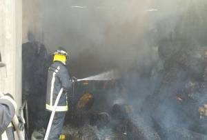 FOTOS: Bomberos sofocaron incendio en bodega de Nopalucan