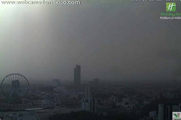 Alertan por nube de polvo y humo en Puebla
