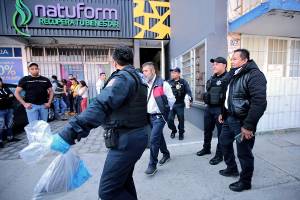 Abogada muere al dispararse arma de un guardia de seguridad en Puebla