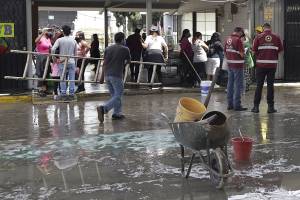 Tres escuelas afectadas por lluvia en Puebla imparten clases a distancia