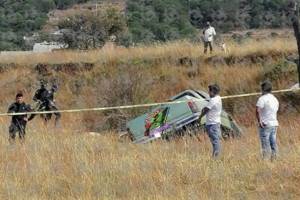 Matan a dos hombres a machetazos y balazos en Amozoc