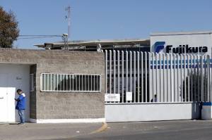 Conflicto laboral en Fujikura, fabricante autopartes en Puebla