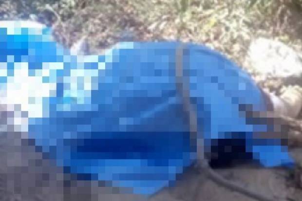 Hallan cadáver embolsado y con heridas de bala en Tlahuapan