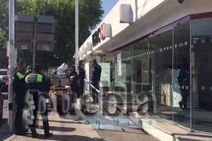 FOTOS: Cuentahabiente es baleado en intento de atraco en HSBC de El Carmen
