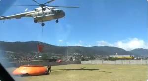 Con helicóptero combaten incendio forestal en Zautla