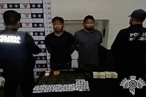 Pareja es detenida con 200 cartuchos útiles y dosis de cocaína en Huejotzingo