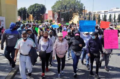 Así se disputan Federico López y Martín Juárez el liderazgo de ambulantes en Puebla