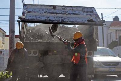 Puebla frena labores de bacheo y pavimentación por contaminación