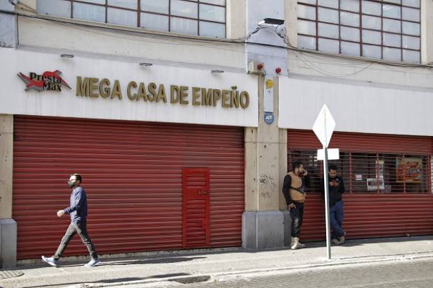 Dan cristalazo a casa de empeño en el centro de Puebla