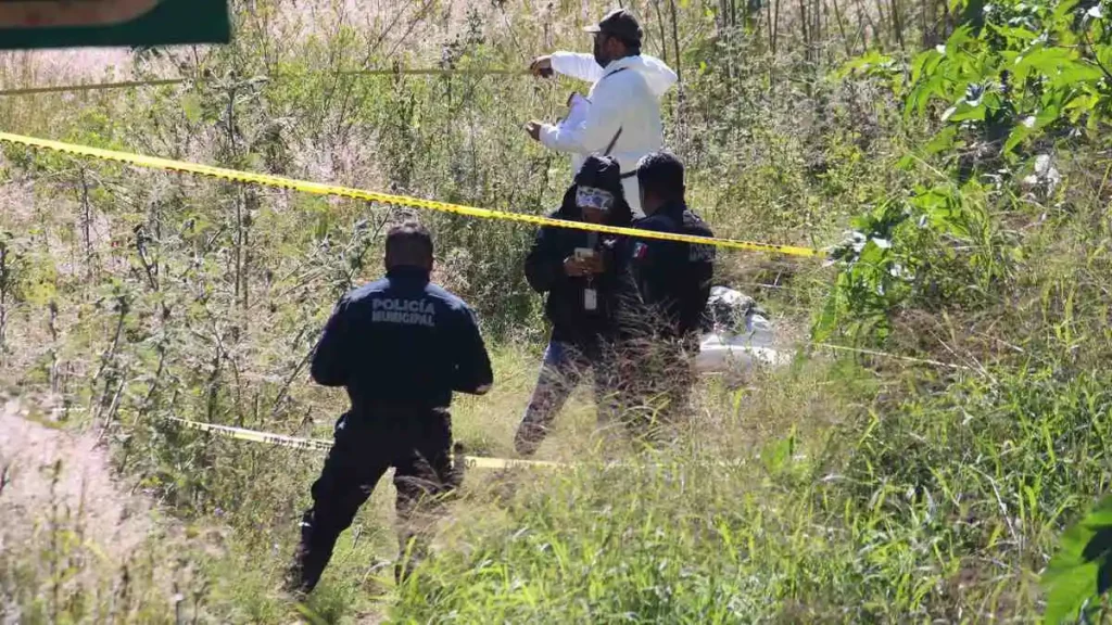 Hallan cadáver embolsado en Cuautlancingo